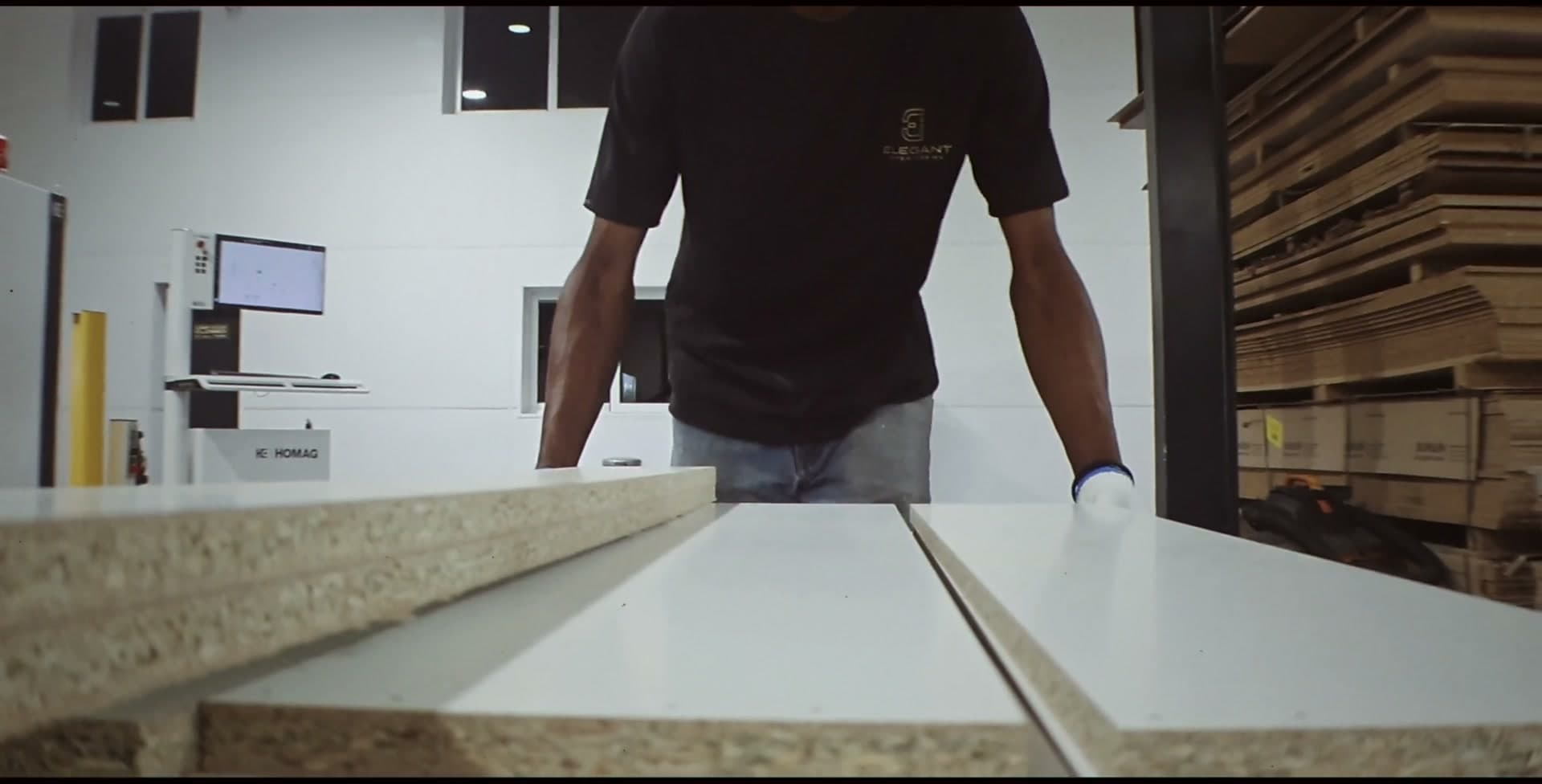 The production floor: panels stacked beside the CNC line
